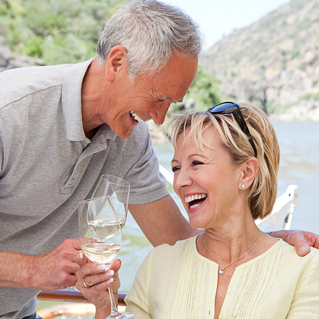 Older couple drinking wine