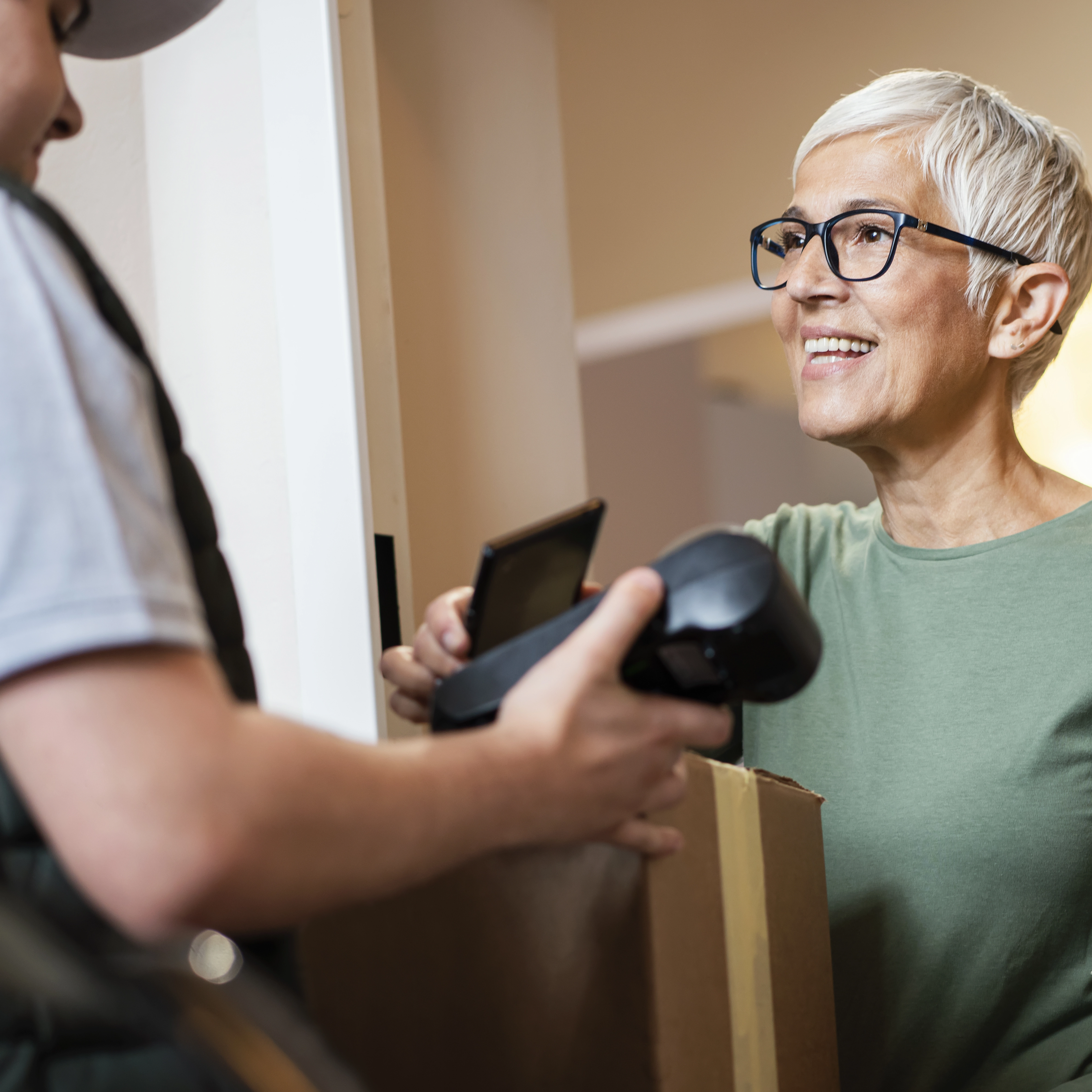 Older women with postal worker